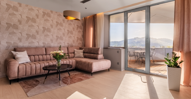 Superior Studio living room with a mountain-view balcony.