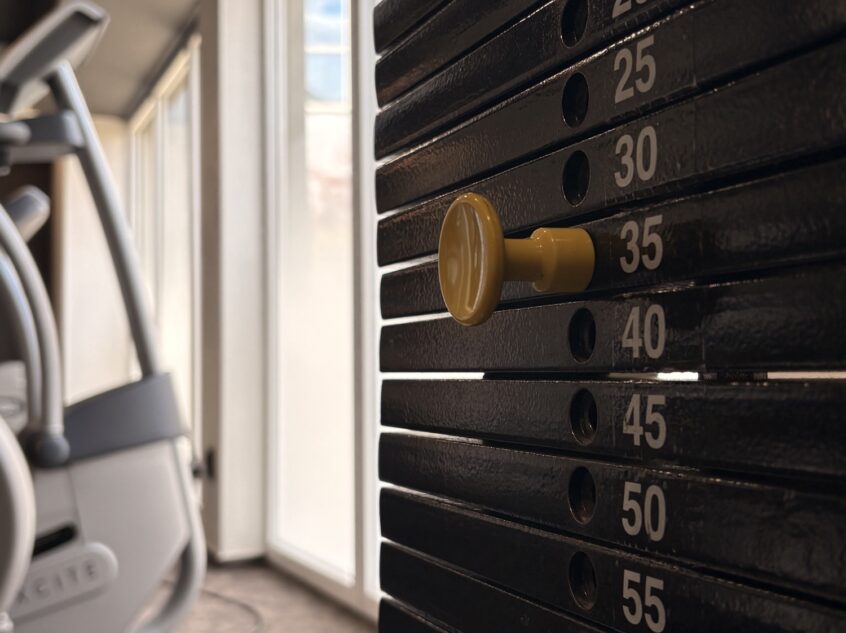 Weight stack in the Never Give Up fitness centre.