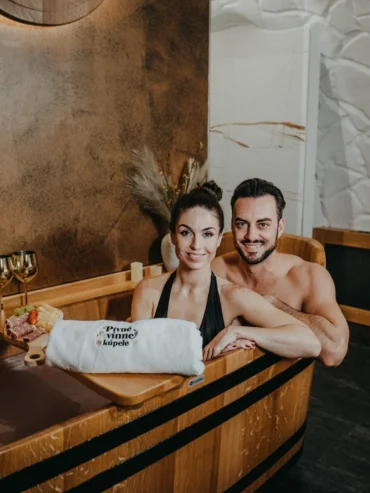 Couple enjoying a beer bath near Žilina.