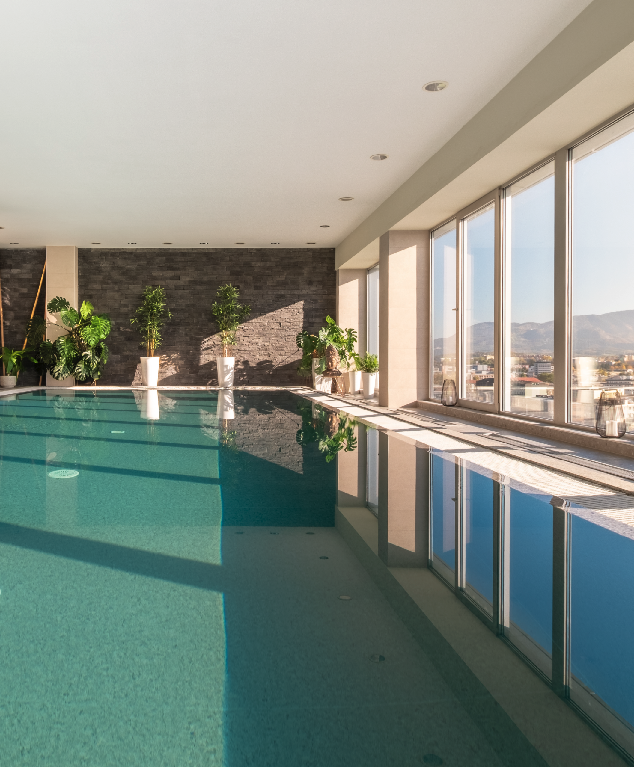 Indoor pool with panoramic windows.